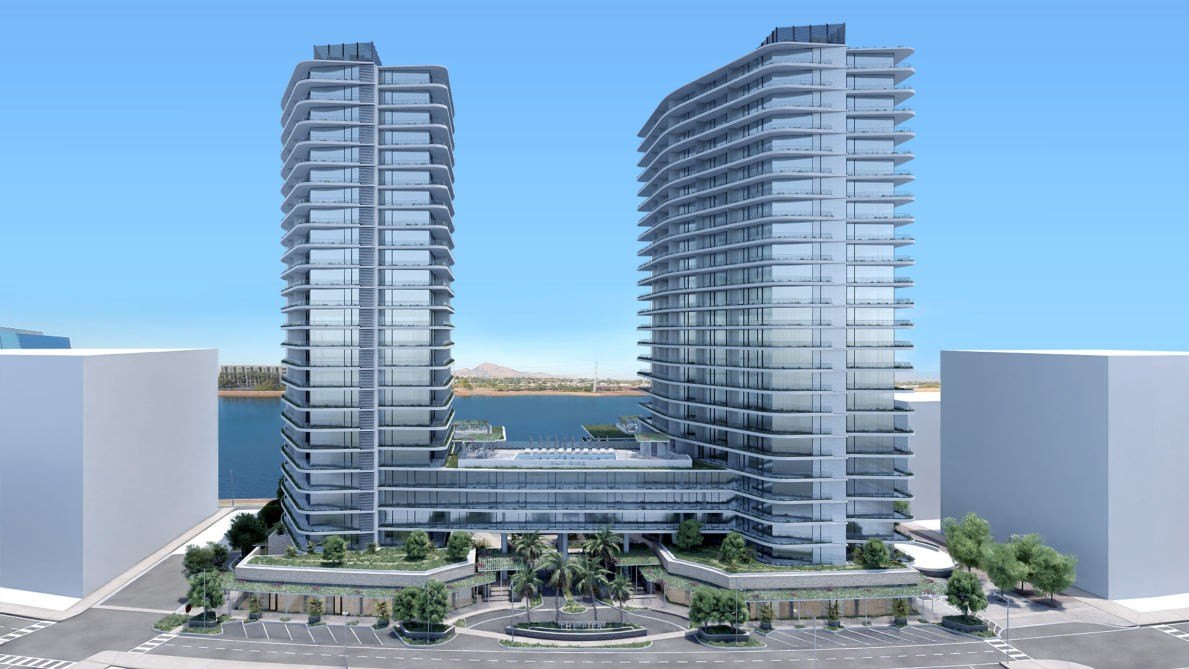 Twin glass residential towers on the waterfront
