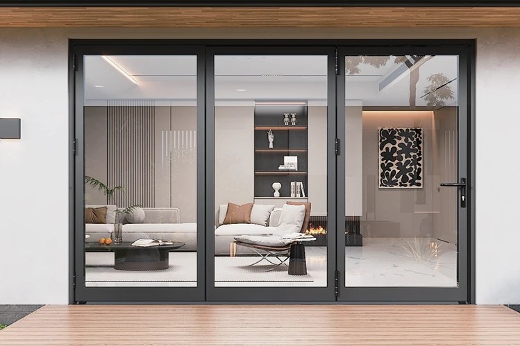 Black aluminum folding glass doors opening onto a lounge