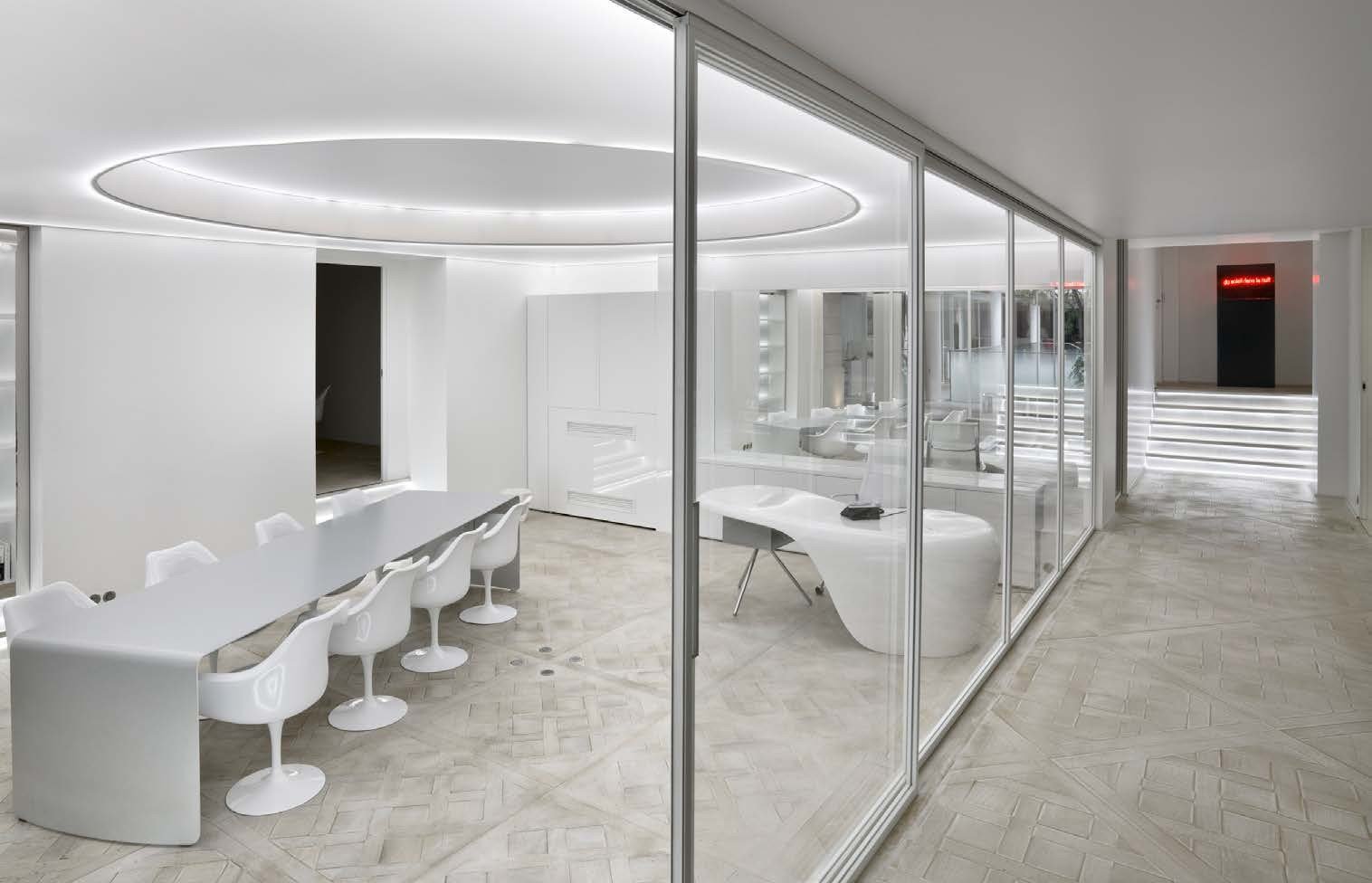 Frameless glass walls around a home office