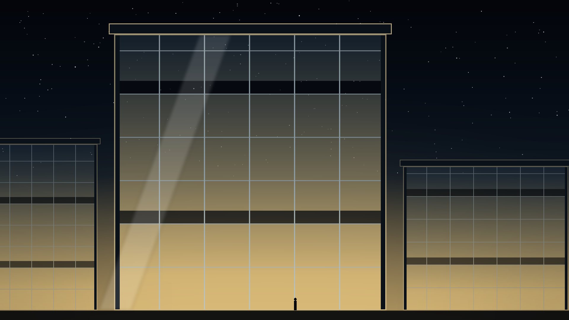 Glass curtain wall reflecting a dusk sky