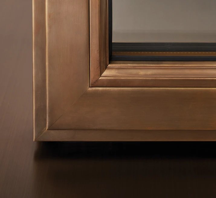 Bronze frame corner with a stepped bead