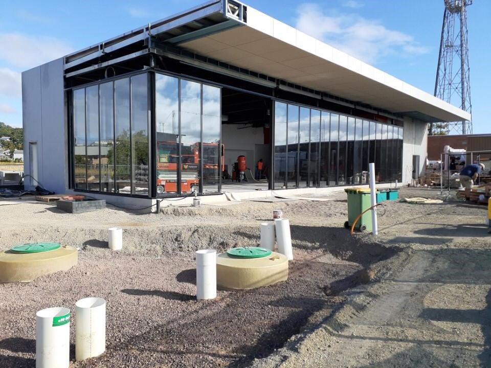 Corner glass storefront wall on a new commercial building