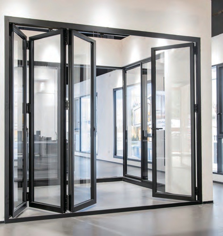 Black aluminum bifold doors folded into a corner