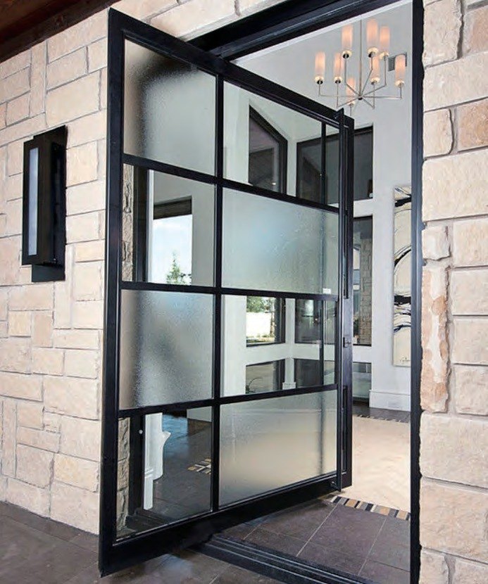 Black steel-look pivot door with divided obscure glass