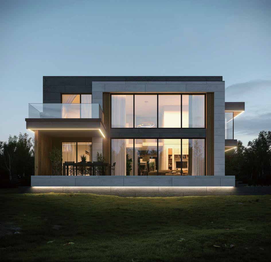 Modern home at dusk with glass balcony railing