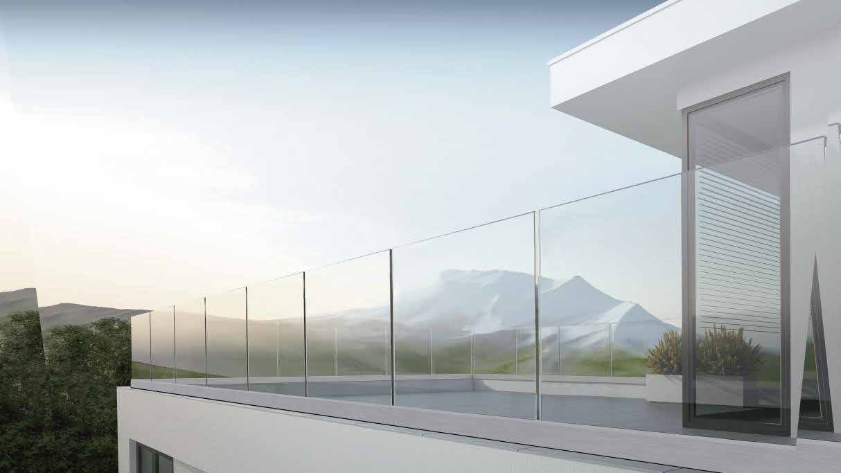 Glass railing and corner window over a mountain view