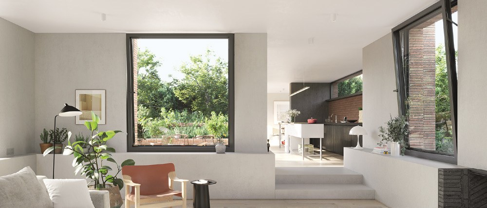 Picture window and tilting sash framing the garden in an open-plan home