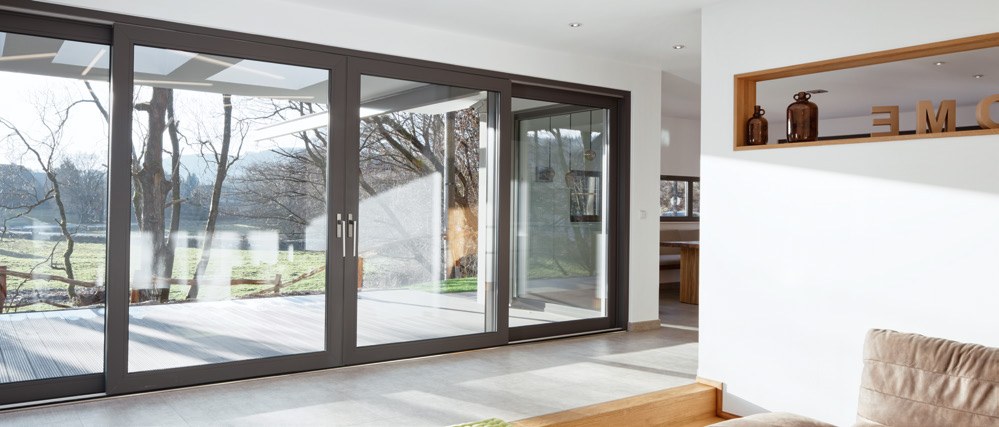 Lift-and-slide door running the width of a living room