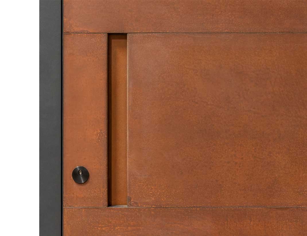 Corten steel entry door with a recessed pull