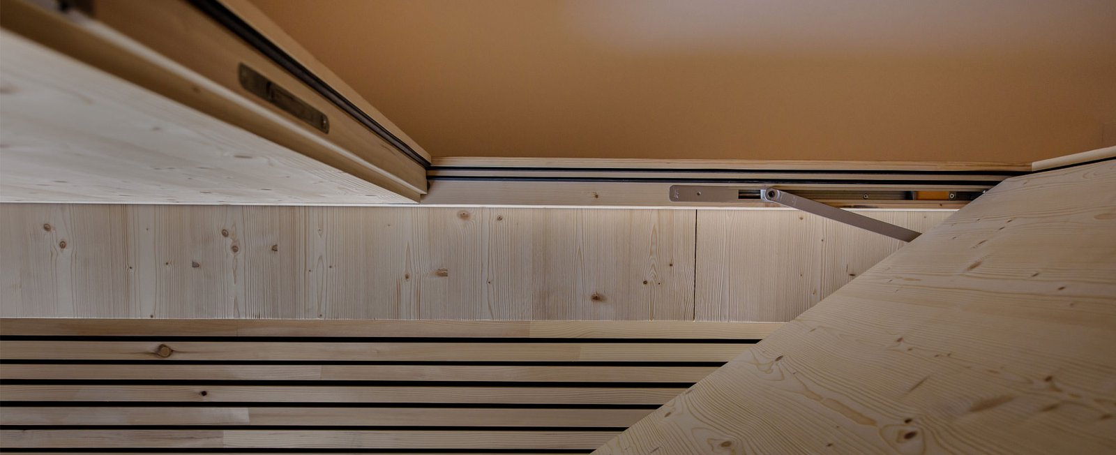 Concealed door closer in a spruce-clad opening